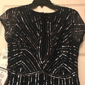 New, never worn black beaded sheath dress.